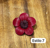 Broches rojos