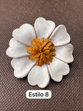 Broches blancos