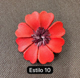 Broches rojos