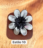 Broches plateados