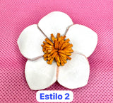 Broches blancos