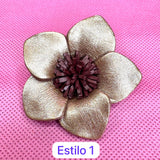 Broches dorados