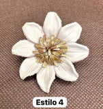 Broches blancos