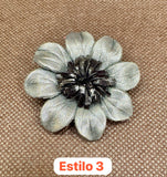 Broches plateados