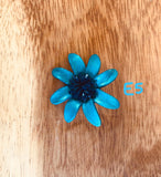 Broches azules