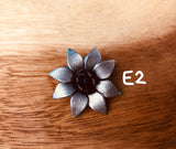 Broches plateados