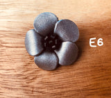 Broches plateados