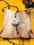 Broches blancos