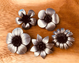Broches plateados