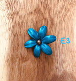 Broches azules