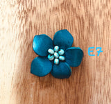 Broches azules